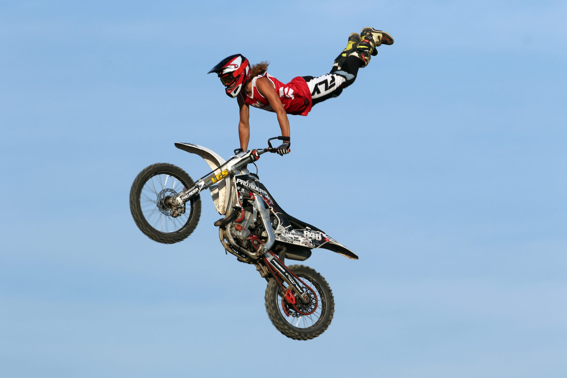 Motocross riders perform heart-stopping stunts at Brighton Speedway ...